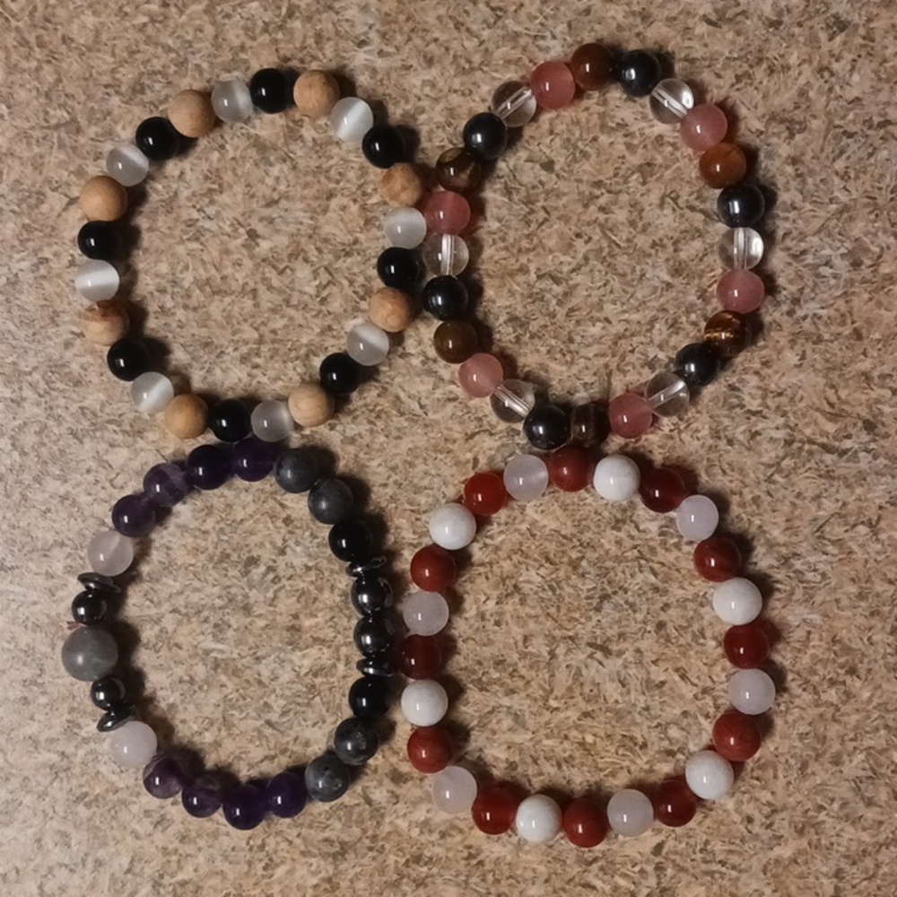 4 Beaded Bracelets. NWOT. OS. Stretchy. Lightweight. Colorful. Meaningful.Sturdy
